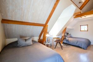 Postel nebo postele na pokoji v ubytování B&B L'Orée du Bois Bourgogne - Adults Only + 37 fotografií