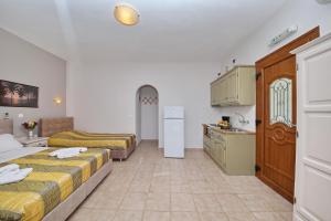 Кровать или кровати в номере Niki Apartments