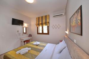 Кровать или кровати в номере Niki Apartments