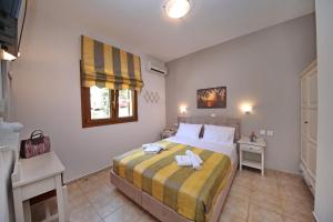 Кровать или кровати в номере Niki Apartments