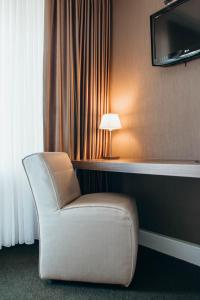 TV a/nebo společenská místnost v ubytování Parkhotel Schmallenberg