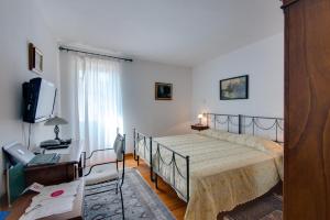 Ein Bett oder Betten in einem Zimmer der Unterkunft Villa Tuttorotto