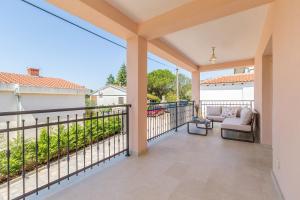 Balkón nebo terasa v ubytování Holiday house MASLINA