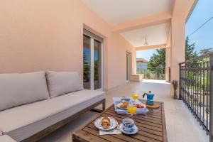 Balkón nebo terasa v ubytování Holiday house MASLINA