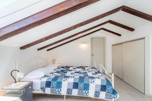Postel nebo postele na pokoji v ubytování Holiday house MASLINA