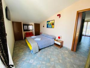 A bed or beds in a room at Ambrosia