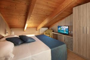 Posteľ alebo postele v izbe v ubytovaní Hotel Cannes - in pieno centro