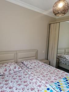 מיטה או מיטות בחדר ב-Vacation Home Nukri