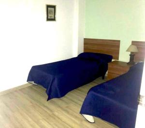 Posteľ alebo postele v izbe v ubytovaní CASA VACACIONAL CONIL