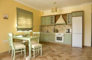 Kuchyňa alebo kuchynka v ubytovaní Nautilus Luxury Suites