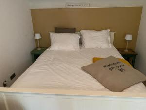 Postelja oz. postelje v sobi nastanitve Huize Nuwenspete