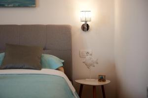 Posteľ alebo postele v izbe v ubytovaní Rooms Antonio