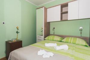 Postel nebo postele na pokoji v ubytování Bed and Breakfast Rooms Sandalj