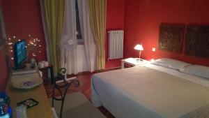 Posteľ alebo postele v izbe v ubytovaní Agorà Residenza
