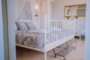 A bed or beds in a room at Deruni Ilıca