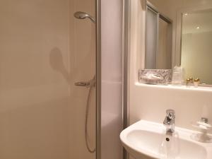 Kúpeľňa v ubytovaní Hotel Tirolerhof
