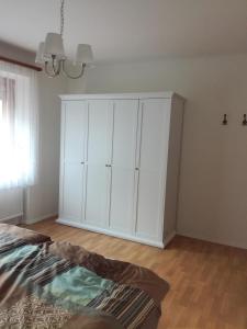 Postel nebo postele na pokoji v ubytování Ferienhaus-Vogelsfelsen