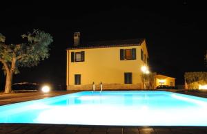 The swimming pool at or close to LA TANA DEL CINGHIALE
