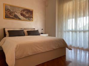 Posteľ alebo postele v izbe v ubytovaní Casa Rosaria