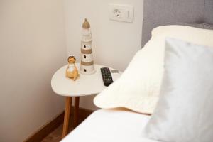 Posteľ alebo postele v izbe v ubytovaní Rooms Antonio