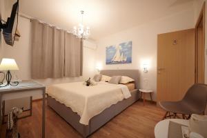 Posteľ alebo postele v izbe v ubytovaní Rooms Antonio