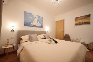 Posteľ alebo postele v izbe v ubytovaní Rooms Antonio