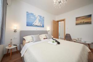 Posteľ alebo postele v izbe v ubytovaní Rooms Antonio