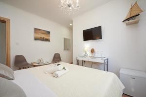 Posteľ alebo postele v izbe v ubytovaní Rooms Antonio
