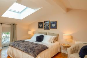 Ένα ή περισσότερα κρεβάτια σε δωμάτιο στο Saint-Emilion-Bordeaux-Propriété de campagne +48 φωτογραφίες