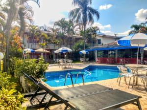 Bazén v ubytování Hotel Pousada Vivendas do Sol e Mar nebo v jeho okolí