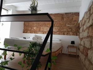 A bed or beds in a room at House Orlando