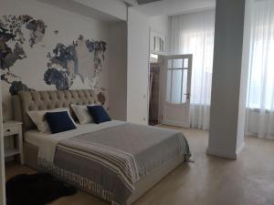 Postel nebo postele na pokoji v ubytování Dom Rabinovicha