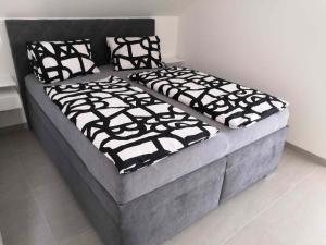 Postel nebo postele na pokoji v ubytování Apartmán Starovičky 406