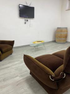 A television and/or entertainment centre at Casa del Credente