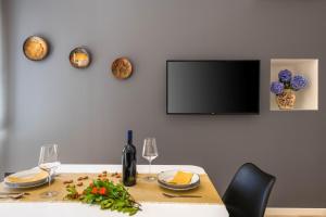 TV a/nebo společenská místnost v ubytování AlPe Mar