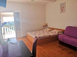 Кровать или кровати в номере Apartments Brkovic