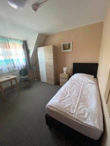 Postel nebo postele na pokoji v ubytování Hotel-Gasthof "Alter Ritter"