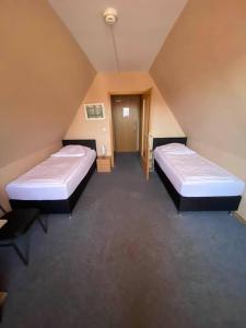 Postel nebo postele na pokoji v ubytování Hotel-Gasthof "Alter Ritter"