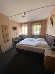 Postel nebo postele na pokoji v ubytování Hotel-Gasthof "Alter Ritter"