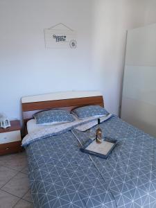 מיטה או מיטות בחדר ב-Apartments Jasna