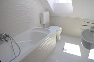 Kúpeľňa v ubytovaní Illés Apartman