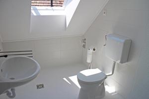 Kúpeľňa v ubytovaní Illés Apartman