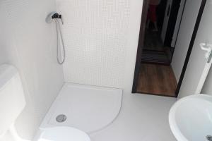 Kúpeľňa v ubytovaní Illés Apartman