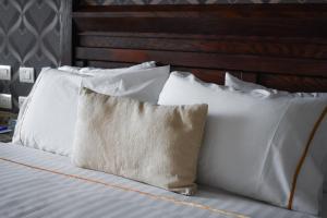 Letto o letti in una camera di Hotel Portobelo