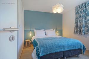 Postel nebo postele na pokoji v ubytování B&B Maison Ruthier