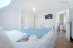 Postel nebo postele na pokoji v ubytování B&B Maison Ruthier