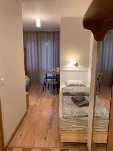 Postel nebo postele na pokoji v ubytování Ohana Budget w Juracie