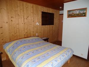 מיטה או מיטות בחדר ב-Chalet La Barme Les Houches Vallée de Chamonix