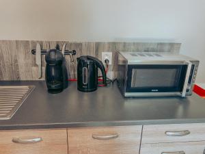 Una cocina o cocineta en Ubytování u Kapličky