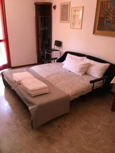 Ένα ή περισσότερα κρεβάτια σε δωμάτιο στο Appartamento per brevi periodi "Teodolinda"